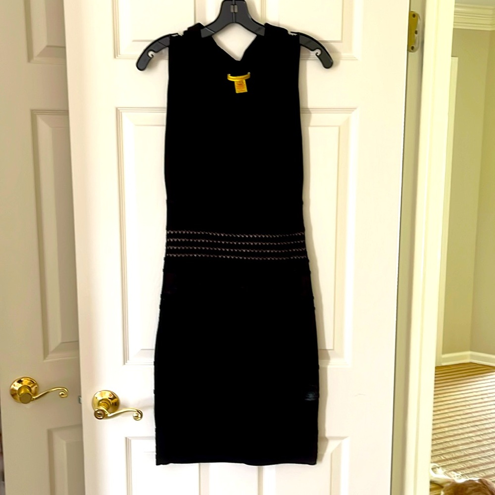 Elegant and sexy Black fitted cocktail dress by Catherine Malandrino.